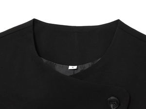 Close-up of black double-breasted vest neckline showing twill fabric and size S label