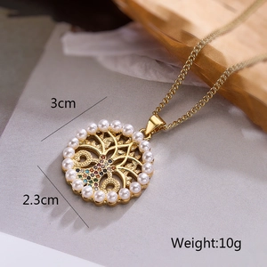 Macro detail of money tree pendant showing 3cm height and 2.3cm width dimensions