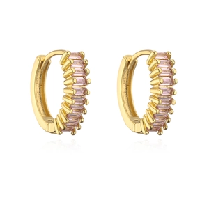 Detail view of 18K gold plated hoop earrings with pink baguette-cut cubic zirconia
