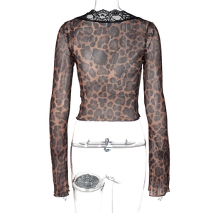 Back view of leopard print mesh crop top featuring long sleeves and black lace trim