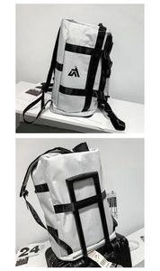 Light gray Oxford fabric travel backpack showing its large capacity and luggage strap function