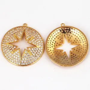 Pave set cubic zirconia star charms in gold plating, front and back detailed view