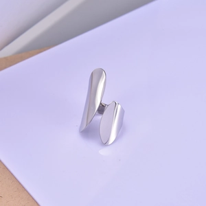 Minimalist polished stainless steel open ring with a modern silver curved design