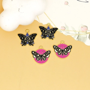 Enamel black butterfly charms with gold moon stars motifs for DIY jewelry making