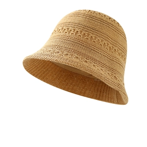 Women's minimalist hollow woven wool bucket hat in light brown with textured knit design