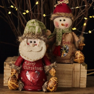 Rustic Christmas burlap gift bags featuring Santa and Snowman with clear heart windows