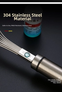 Detailed macro view showing the food grade SUS 304 stainless steel stamp on the whisk handle