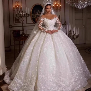 Luxury lace wedding dress with long sleeves, sequins, and royal ball gown silhouette