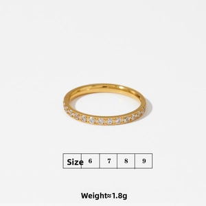 Macro shot of gold-plated eternity ring with size and weight details for women