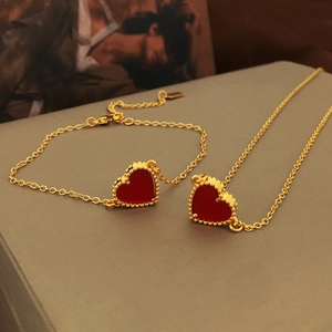 Elegant 18K gold plated necklace and bracelet set with red resin heart pendants