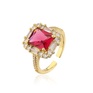 Close-up of 18K gold-plated adjustable ring featuring a large square red zircon center stone