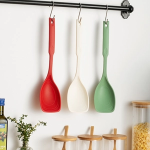 Hanging silicone spatulas in red, beige and green colors for non-stick cookware