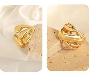 Detail view of the artistic golden irregular open ring with an organic liquid texture