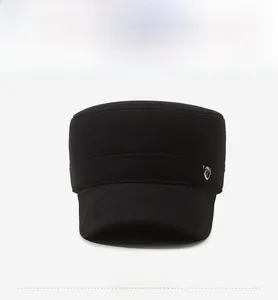 Front view of black cadet cap featuring a metallic shield logo and premium thick fabric