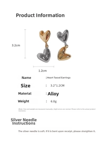 Detail view of heart tassel earrings showing dimensions 3.2x1.2cm and mixed metal finish
