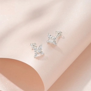 Detail of S925 silver stud earrings with marquise opal stone and cubic zirconia accents