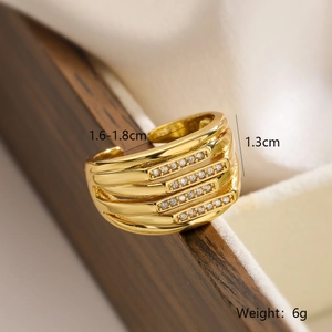 Detail shot of a four-layer gold-plated ring with zircon stones showing 1.3cm width and 6g weight