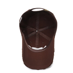 Deep brown cotton baseball cap showing internal six-panel structure and adjustable buckle