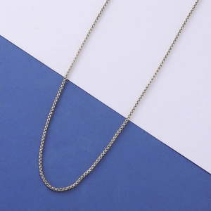 Polished silver stainless steel adjustable box chain necklace on blue and white background
