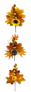 Detail of artificial sunflower, maple leaf, and berry picks for autumn decoration