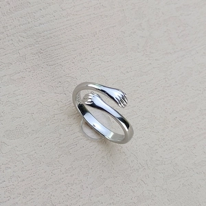 Adjustable S925 sterling silver hug ring with interlocking hands for couples