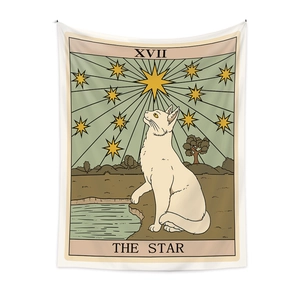 Detail of bohemian tapestry featuring The Star tarot card design with a white cat