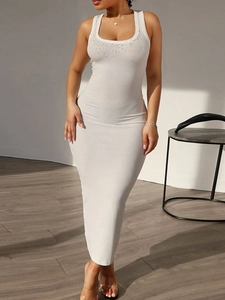 Elegant white ribbed knit maxi dress with square neck and rhinestone accents
