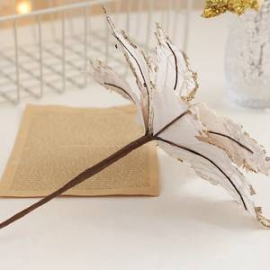 White and gold artificial Christmas flower with glitter edges for holiday tree decoration