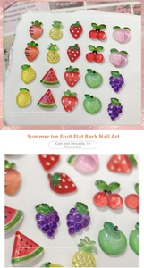 Macro detail of ice-translucent fruit nail charms with fine glitter and 3D textures