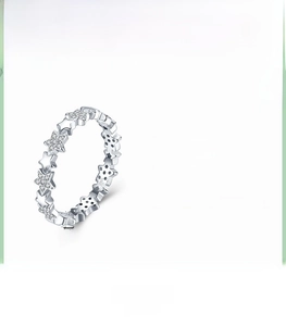 Detailed view of 4mm S925 sterling silver star ring with inlaid cubic zirconia stones