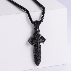 Men's black titanium steel skull cross pendant necklace on minimalist white background