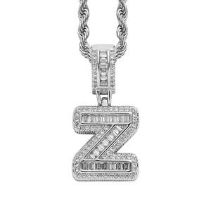 Macro detail of silver letter Z pendant with iced out cubic zirconia on a rope chain
