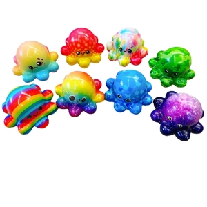 Squishy octopus toys in various patterns including rainbow, tie-dye, and camo styles