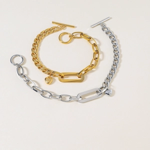 Gold and silver chunky link bracelets with heart pendant and OT toggle closure
