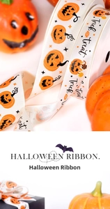 Close-up of Halloween pumpkin Trick or Treat printed grosgrain ribbon for gift wrapping