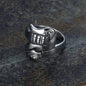 Retro stainless steel guitar ring for men with vintage silver finish on dark rock stone
