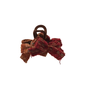 Elegant red-brown tweed bow hair claw clip made of acrylic and textured fabric