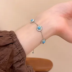 Bracelet vintage argenté avec perles turquoise géométriques et zircons étincelants