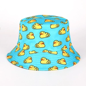 Detailed flat lay of sky blue bucket hat featuring yellow cartoon duck patterns