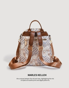 Detail view of the backpack back featuring a hidden anti-theft zipper and leather straps