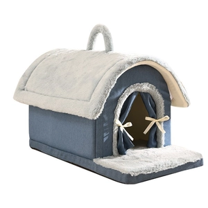 Closed pet bed for cats and small dogs in blue fabric with gray plush trim and handle