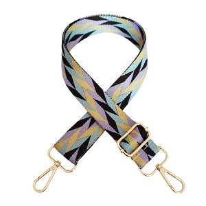 Adjustable geometric diamond pattern bag strap with gold metal hooks and colorful webbing
