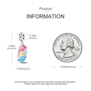 Detailed size comparison of the Pisces zodiac charm next to a 25-cent coin for scale