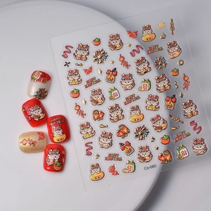 Detail of 3D embossed Chinese New Year nail stickers with lucky lion and gold motifs