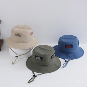 Outdoor quick-dry bucket hat with sun protection and adjustable windproof strap for kids
