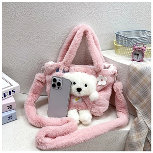 Pink plush handbag for girls featuring cute 3D bear and flower charms with fuzzy texture