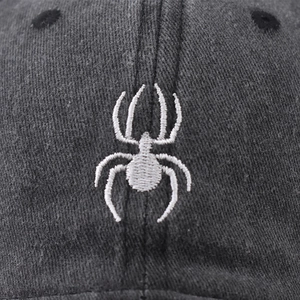 Washed cotton baseball cap in dark grey featuring a 3D white spider embroidery design