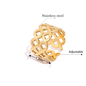 Adjustable golden stainless steel ring with hollow clover pattern, width 1.2 cm detail