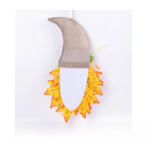 Back view of autumn gnome wreath with orange maple leaves and grey burlap hat decoration