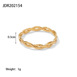 Macro detail of 18K gold plated twisted rope ring showing 0.3cm width and braided texture